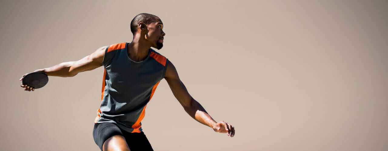 Athletic throwing discuss throw